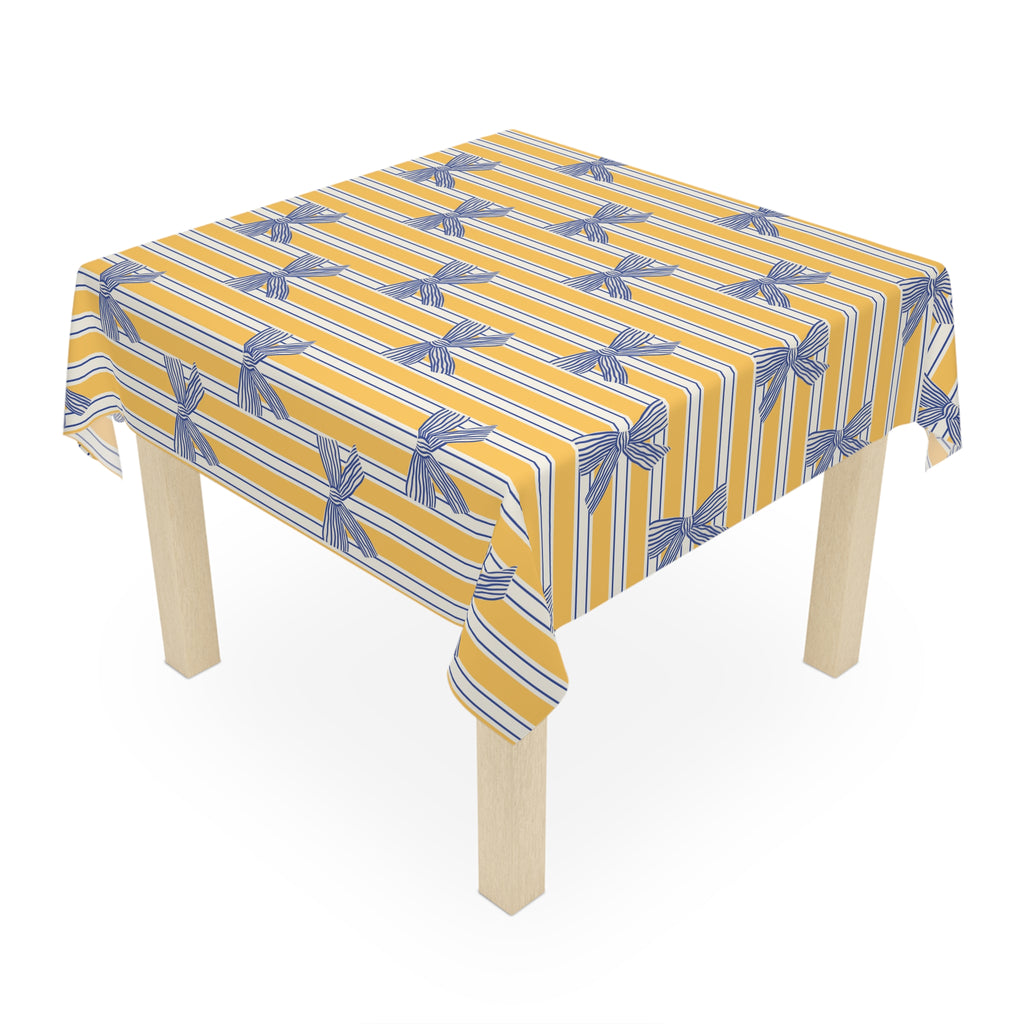 Striped Yellow Tablecloth with Blue Bow Pattern