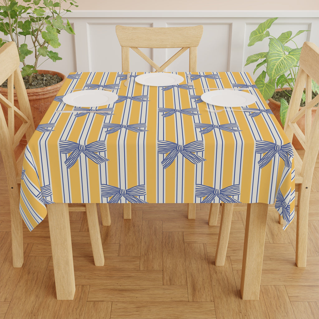 Striped Yellow Tablecloth with Blue Bow Pattern