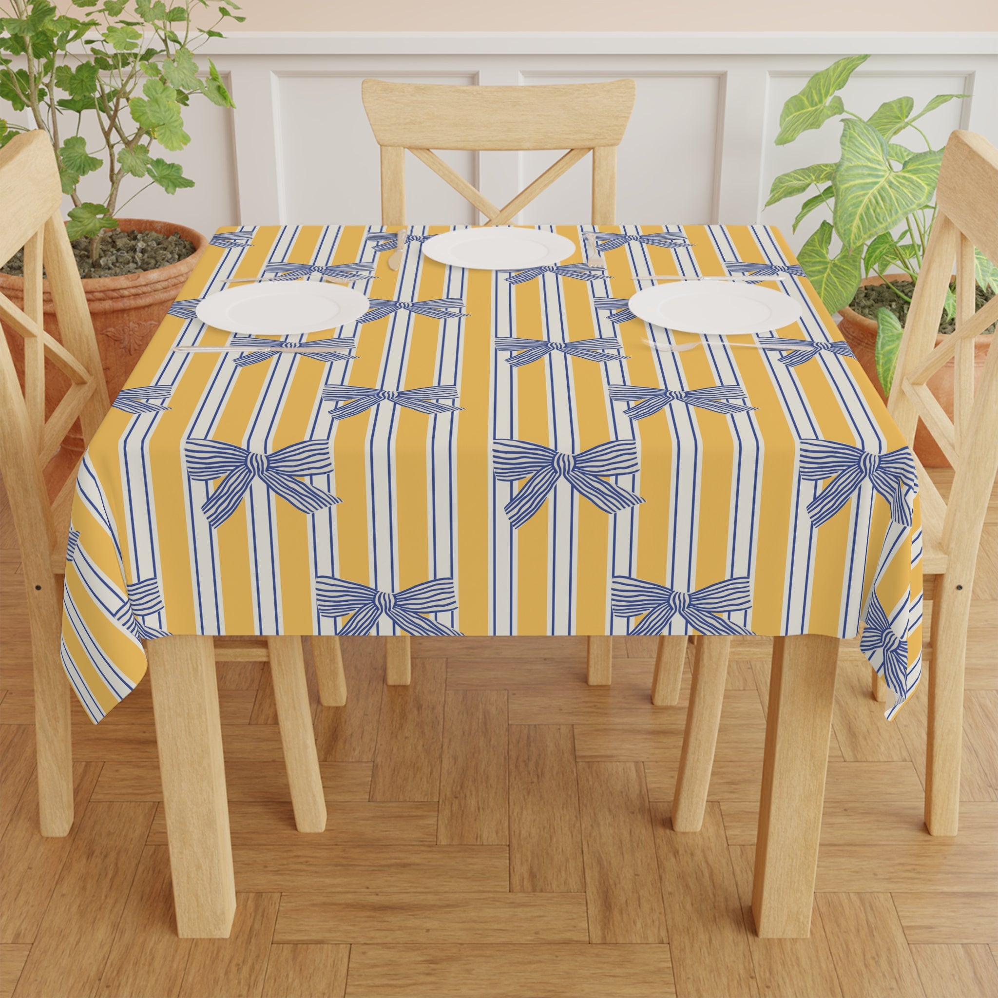 Striped Yellow Tablecloth with Blue Bow Pattern